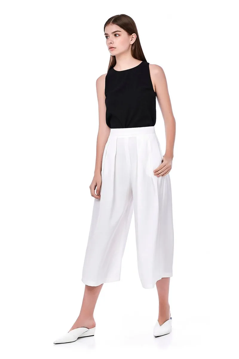 High-Waisted Pleated Trousers